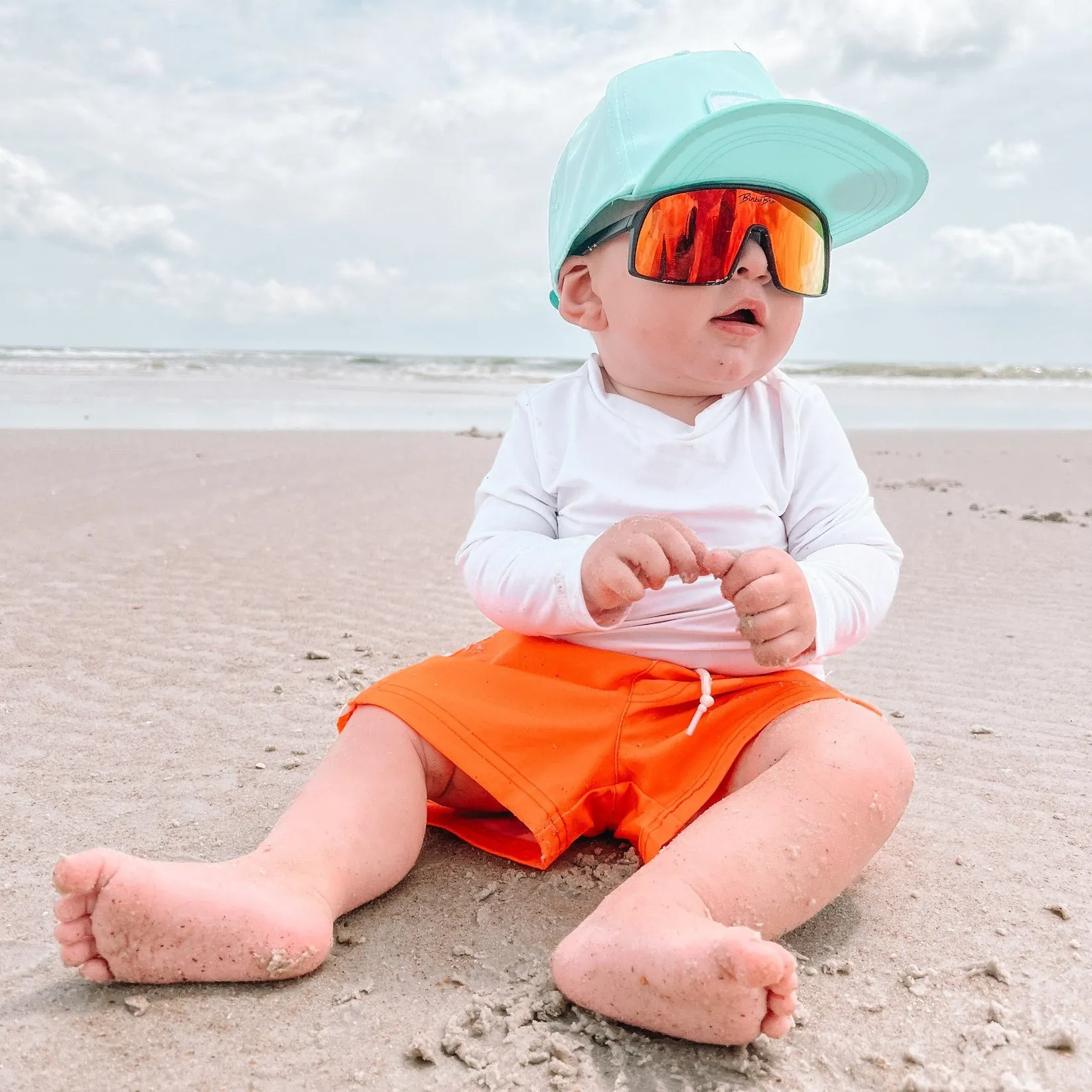 Neon Orange Checkered Swim Trunks